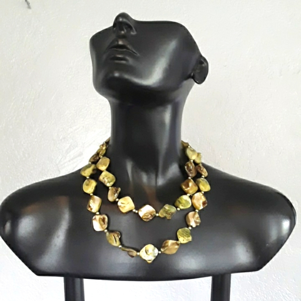 Shell necklace with brass beads